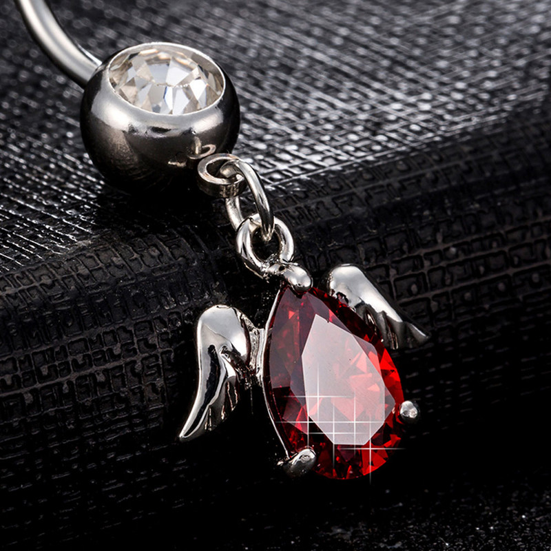 Sädelev punane kristall, süda, naba, augustamine, rippuvad kõrvarõngad, lillad rohelised kalliskivid, nööp-sõrmused naiste peol, rannakõrva ehted