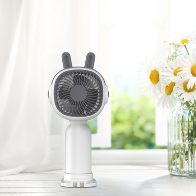 Asmeninis ventiliatorius su telefono stovu gali būti naudojamas kaip mobiliojo telefono laikiklis Mielas mini nešiojamas ventiliatorius bendrabučio virtuvei vasaros sporto žygiams