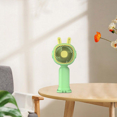 Asmeninis ventiliatorius su telefono stovu gali būti naudojamas kaip mobiliojo telefono laikiklis Mielas mini nešiojamas ventiliatorius bendrabučio virtuvei vasaros sporto žygiams