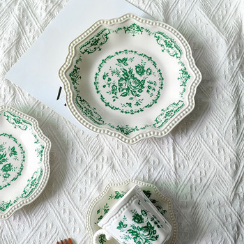 Kaasaegne keraamiline taldrik käsitsi maalitud lillekujundus Pärastlõunatee puuviljasalatitaldrikud Euroopa lääne restorani lauale mõeldud magustoiduroog