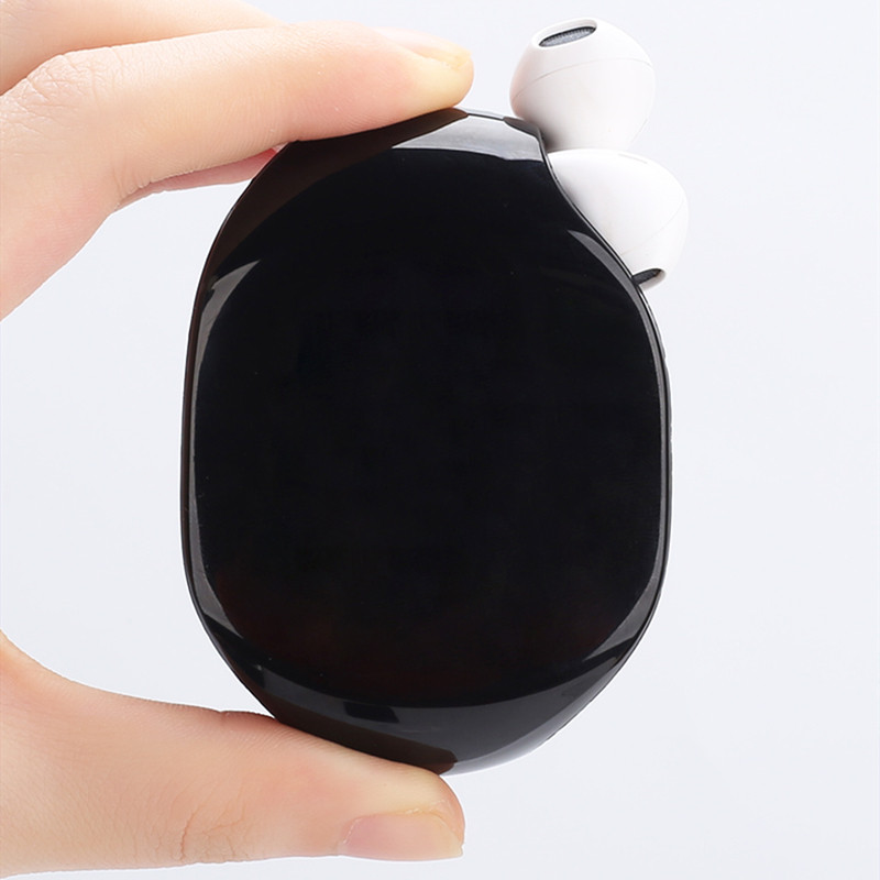 Automatinis kabelių suvyniojimo ausinių laikiklio įvynioklis, skirtas mobiliojo telefono duomenų kabeliams.