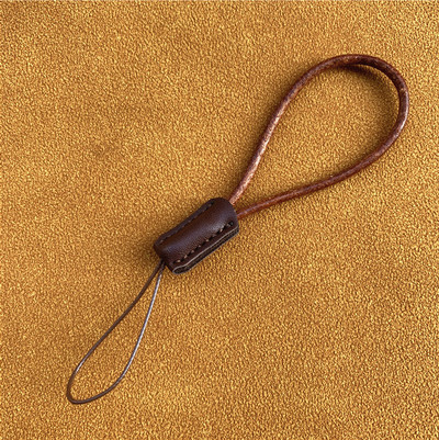Mobiliojo telefono grandinėlė, odinė virvė mobiliojo telefono žavesiui, karvės odos dirželis, trumpas, paprastas rankų darbo raktų pakabukas, apsaugantis nuo praradimo