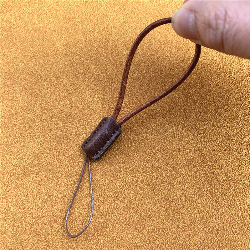 Mobiliojo telefono grandinėlė, odinė virvė mobiliojo telefono žavesiui, karvės odos dirželis, trumpas, paprastas rankų darbo raktų pakabukas, apsaugantis nuo praradimo