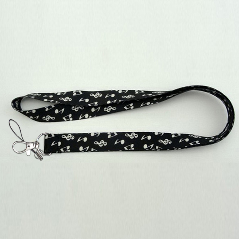 Minkšti fortepijono klavišai, patvarūs, „pasidaryk pats“ aksesuarai, rankoje laikomi pakabinami užrašai Pradžia Mobiliojo telefono dirželiai