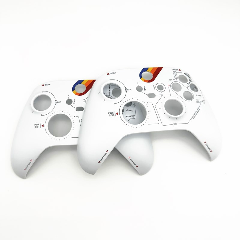 Starfieldi piiratud versiooniga kontrolleri ümbris kuldsete funktsiooninuppudega Xbox Series S jaoks Xbox Series X jaoks mõeldud eesmine kaitsekate