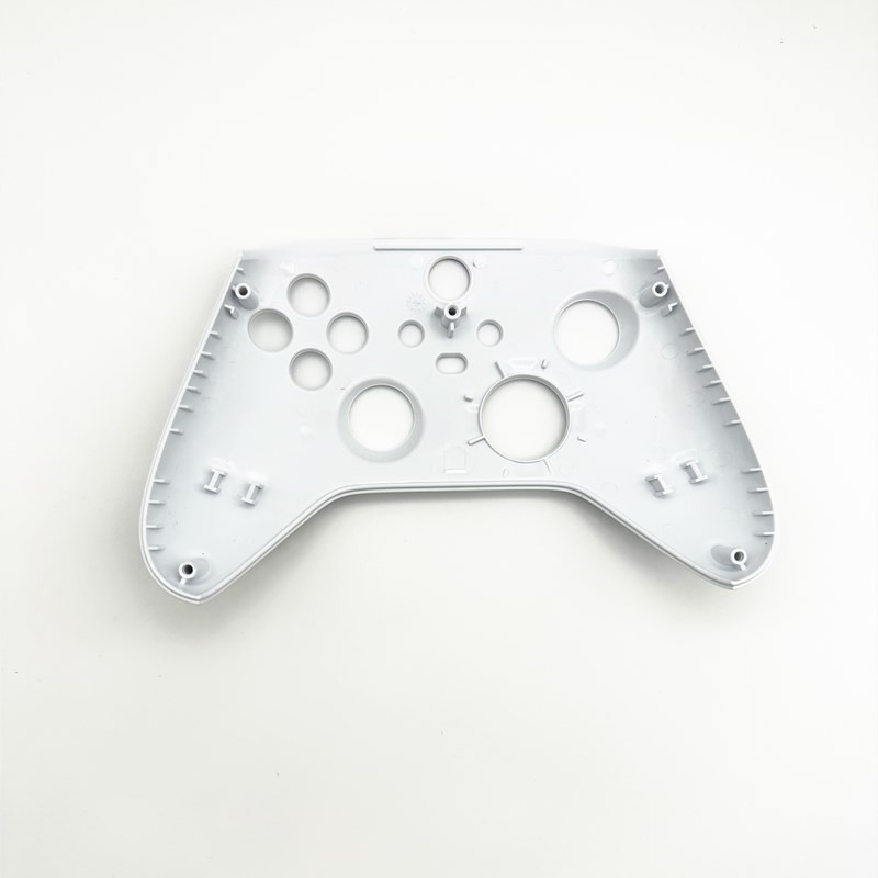 Starfieldi piiratud versiooniga kontrolleri ümbris kuldsete funktsiooninuppudega Xbox Series S jaoks Xbox Series X jaoks mõeldud eesmine kaitsekate