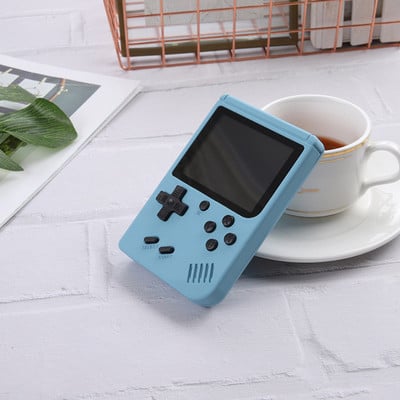 500-ühes mini-retro-kaasaskantav pihukonsool mängumängija 8-bitine 3,0-tolline värviteler Kahe lapse värvimängumängija Sisseehitatud 500 mängu
