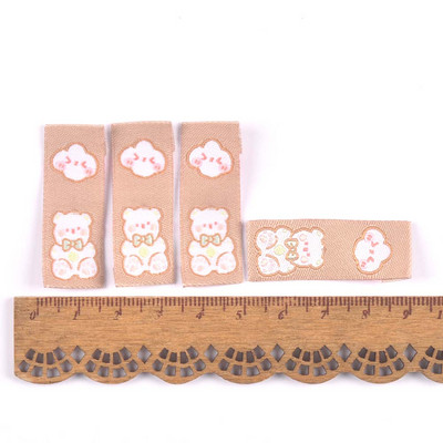 50 vnt. rudos serijos animacinių filmukų etiketės, skirtos siuvimui, priedai Vaikiški drabužiai „pasidaryk pats“ amatai, rankų darbo drabužiai, reikmenys Mielos etiketės c3577