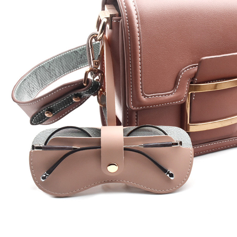 Kaasaskantav rippuv prillikott Pehmest PU-nahast kompressioonivastane päikeseprillide ümbris prillide ümbris konteineri hoiukarp