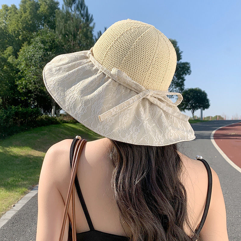 Корейска версия на дантелена винилова UV дантелена слънцезащитна шапка с кофа Дамска лятна ваканционна сладка каишка с лък с голяма периферия Сгъваема шапка за слънце