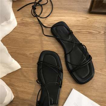 Римски сандали Дамски лято 2023 Нова мода Обувки с кръстосани връзки с плоски отворени пръсти Ежедневни елегантни рокли Плажни гладиаторски сандали с връзки