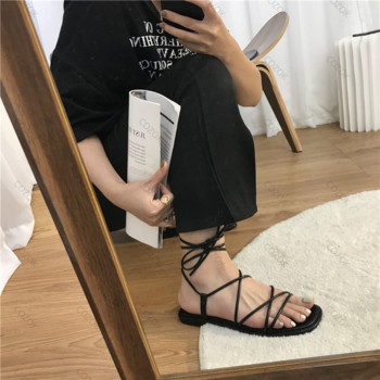 Римски сандали Дамски лято 2023 Нова мода Обувки с кръстосани връзки с плоски отворени пръсти Ежедневни елегантни рокли Плажни гладиаторски сандали с връзки