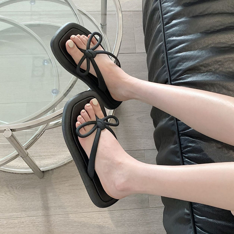 2023-as nyár divatos tanga papucsok női papucsok ortopéd csíptetős lábujj otthoni csúszdák Cipők íjcsomó kültéri tengerpart tengeri lapos szandálok