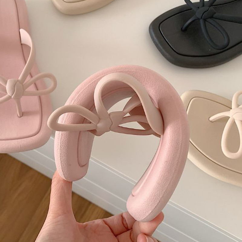 2023-as nyár divatos tanga papucsok női papucsok ortopéd csíptetős lábujj otthoni csúszdák Cipők íjcsomó kültéri tengerpart tengeri lapos szandálok