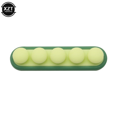 Νέος σταθεροποιητής καλωδίων μπιζελιού USB Σφιγκτήρας φόρτισης σύρματος σιλικόνης Αυτοκόλλητη βάση στήριξης γραμμής Συσκευή αποθήκευσης Καλωδιακή γραμμή διαχείρισης