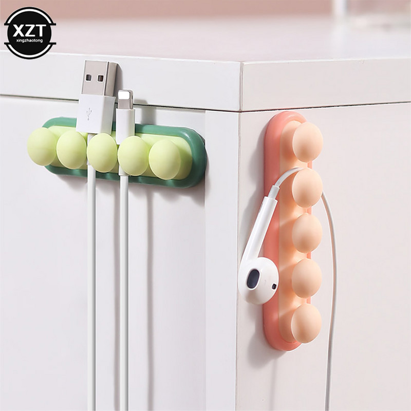 Νέος σταθεροποιητής καλωδίων μπιζελιού USB Σφιγκτήρας φόρτισης σύρματος σιλικόνης Αυτοκόλλητη βάση στήριξης γραμμής Συσκευή αποθήκευσης Καλωδιακή γραμμή διαχείρισης