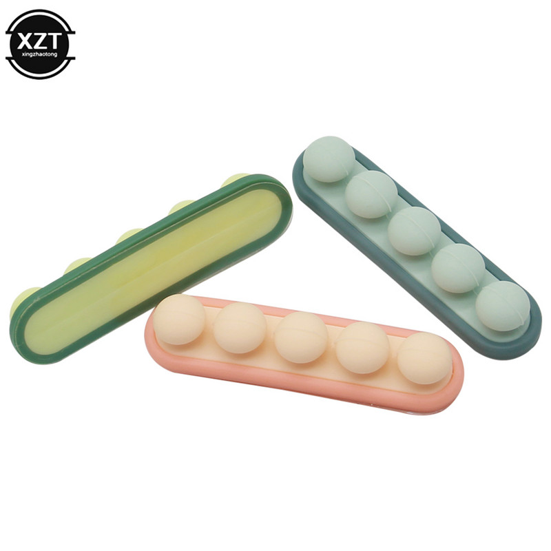 Νέος σταθεροποιητής καλωδίων μπιζελιού USB Σφιγκτήρας φόρτισης σύρματος σιλικόνης Αυτοκόλλητη βάση στήριξης γραμμής Συσκευή αποθήκευσης Καλωδιακή γραμμή διαχείρισης