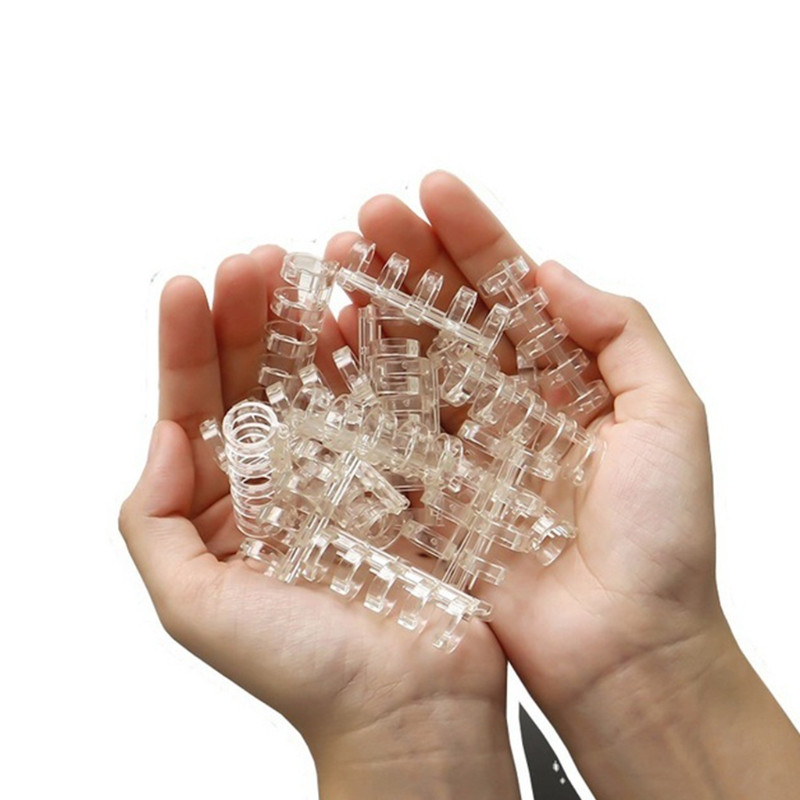 10 tk. Mitmeotstarbeline 5 rõngaga lahtiste lehtedega sidekamm 5 rõngaga värviline sidumisklamber