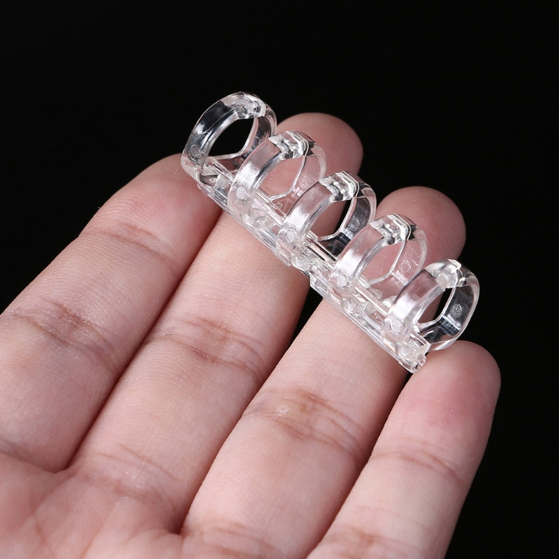 10 tk. Mitmeotstarbeline 5 rõngaga lahtiste lehtedega sidekamm 5 rõngaga värviline sidumisklamber