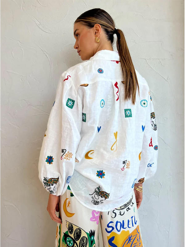 Trükitud moesärk naiste top revääridega, pikkade laternatega varrukatega üherealised pühadesärgid Naiste suvi 2023 Graffiti topid pluus