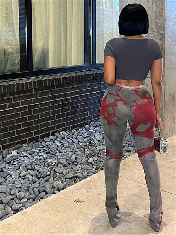 Keistas pūlingas raštas, elastinės moteriškos kelnės aukštu juosmeniu, platėjančios kelnės