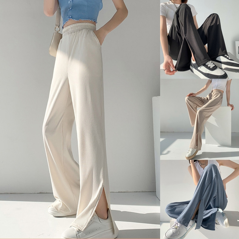 Naiste õhukesed elastsed kõrge vöökohaga laia säärega püksid vabaaja vabad ühevärvilised vintage küljeosa lõhestatud servaga soonikkoes sirged püksid