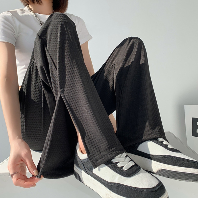 Naiste õhukesed elastsed kõrge vöökohaga laia säärega püksid vabaaja vabad ühevärvilised vintage küljeosa lõhestatud servaga soonikkoes sirged püksid