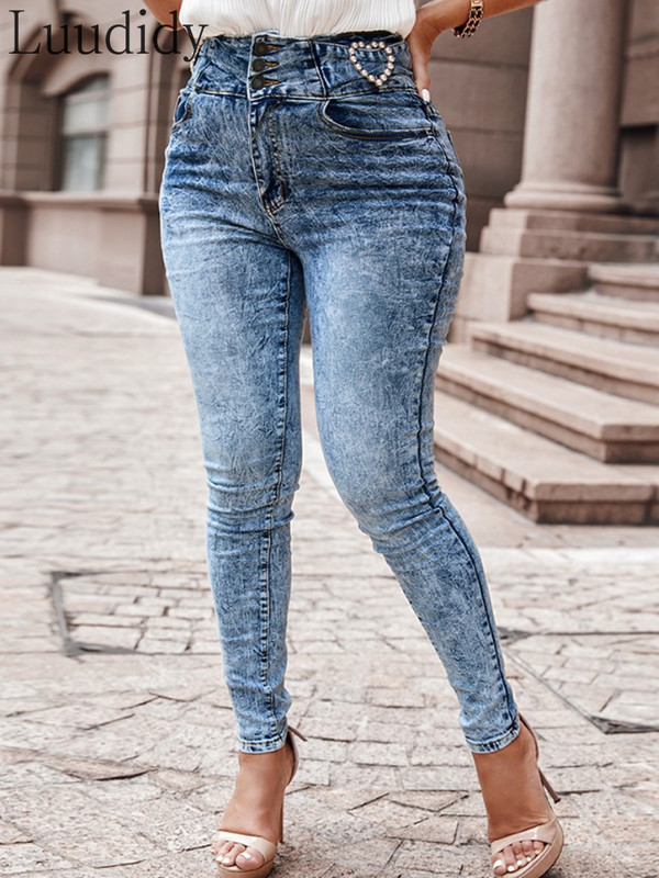 Ženske uske traperice visokog struka s kopčanjem u obliku bisera