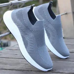 Suvised meeste kingad uus mood valge hingav võrgust spordijalatsid meeste madala nööriga nööriga põrutusi summutavad jooksujalatsid