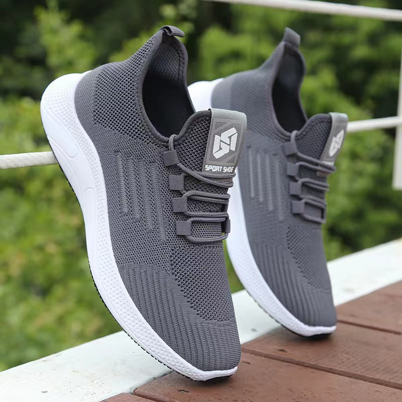 Suvised meeste kingad uus mood valge hingav võrgust spordijalatsid meeste madala nööriga nööriga põrutusi summutavad jooksujalatsid