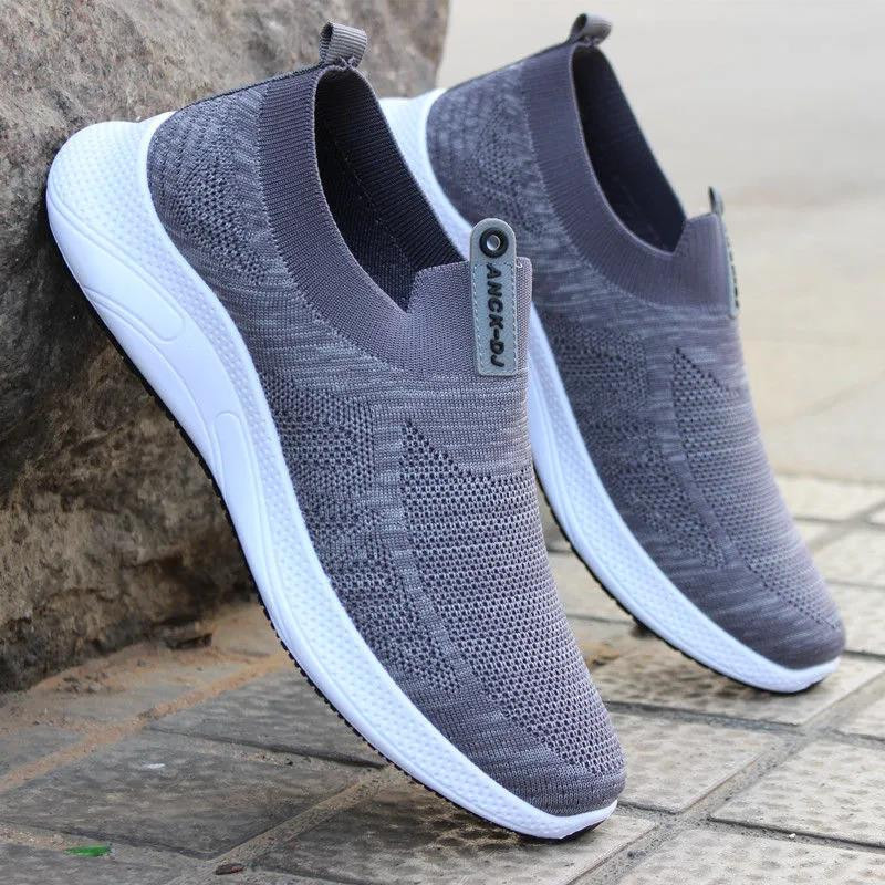 Suvised meeste kingad uus mood valge hingav võrgust spordijalatsid meeste madala nööriga nööriga põrutusi summutavad jooksujalatsid