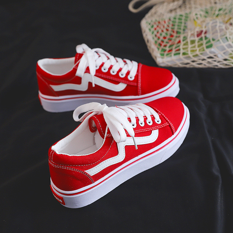 Νέα μαύρα λευκά ριγέ παπούτσια καμβά Γυναικεία αναπνεύσιμα Skateboarding Φοιτητικά πάνινα παπούτσια Leisure Flat παπούτσια τένις