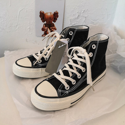 Unisex kõrged naiste lõuendjalatsid Meeste vabaaja sörkimisjalatsid Tudengite Vulcanize kingad Nööritavad naiste tossud Zapatos De Mujeres