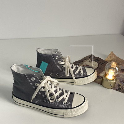 Unisex kõrged naiste lõuendjalatsid Meeste vabaaja sörkimisjalatsid Tudengite Vulcanize kingad Nööritavad naiste tossud Zapatos De Mujeres