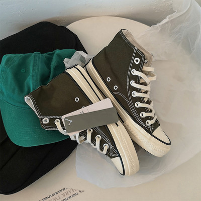 Unisex kõrged naiste lõuendjalatsid Meeste vabaaja sörkimisjalatsid Tudengite Vulcanize kingad Nööritavad naiste tossud Zapatos De Mujeres