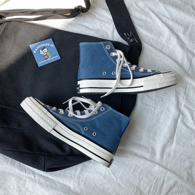 Unisex kõrged naiste lõuendjalatsid Meeste vabaaja sörkimisjalatsid Tudengite Vulcanize kingad Nööritavad naiste tossud Zapatos De Mujeres