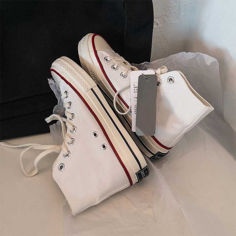 Unisex kõrged naiste lõuendjalatsid Meeste vabaaja sörkimisjalatsid Tudengite Vulcanize kingad Nööritavad naiste tossud Zapatos De Mujeres