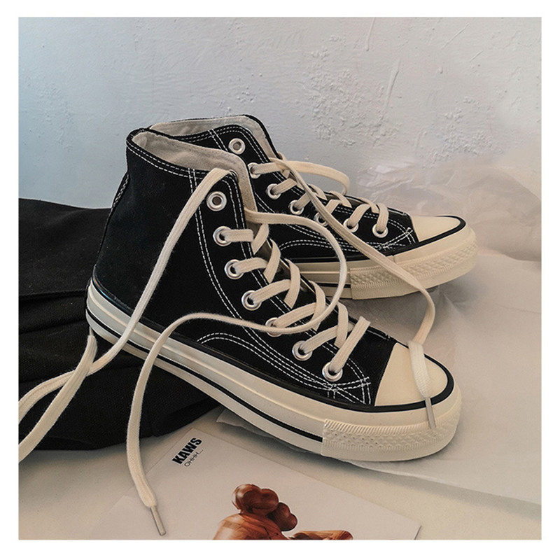 Unisex kõrged naiste lõuendjalatsid Meeste vabaaja sörkimisjalatsid Tudengite Vulcanize kingad Nööritavad naiste tossud Zapatos De Mujeres