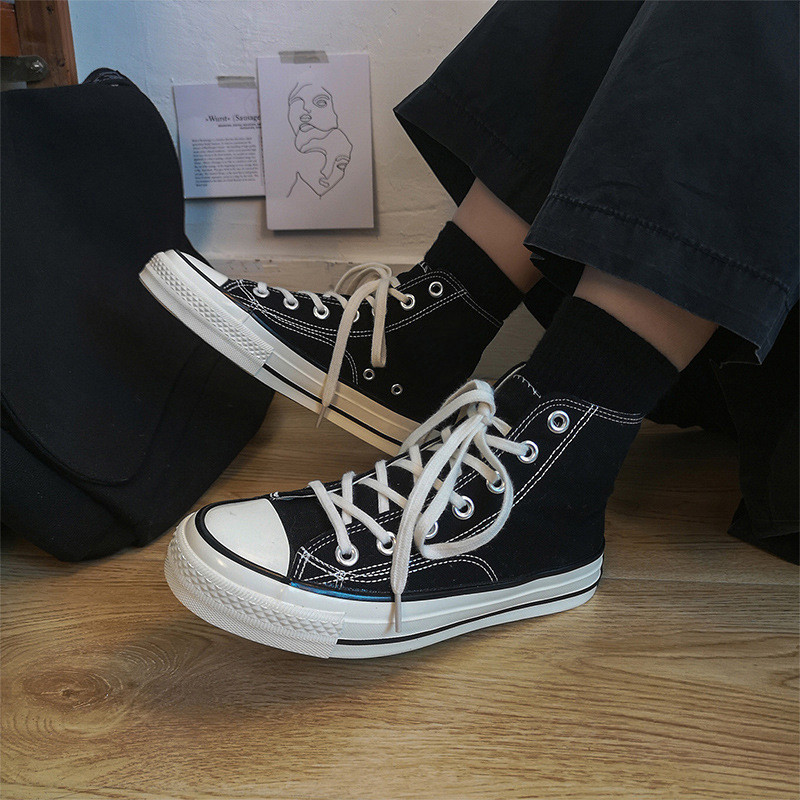 Unisex kõrged naiste lõuendjalatsid Meeste vabaaja sörkimisjalatsid Tudengite Vulcanize kingad Nööritavad naiste tossud Zapatos De Mujeres