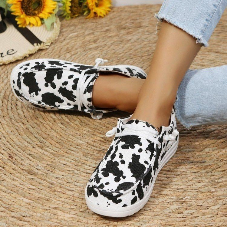 2023 Νέα γυναικεία γαλακτοκομικά παπούτσια με ρίγες αγελάδας βουλκανισμένα ελαφριά ίσια παπούτσια Ανοιξιάτικα πάνινα παπούτσια που αναπνέουν σέξι Πωλούν καλά γυναικεία παπούτσια