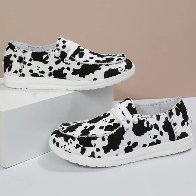 2023 Νέα γυναικεία γαλακτοκομικά παπούτσια με ρίγες αγελάδας βουλκανισμένα ελαφριά ίσια παπούτσια Ανοιξιάτικα πάνινα παπούτσια που αναπνέουν σέξι Πωλούν καλά γυναικεία παπούτσια