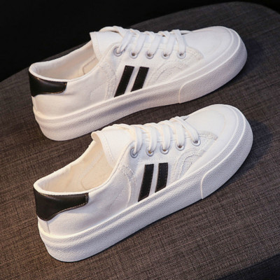 Naiste tossud 2023 Moodsad hingavad vulkaniseeritud kingad Naiste PU-nahast platvormkingad Naiste nööriga vabaajajalatsid valged