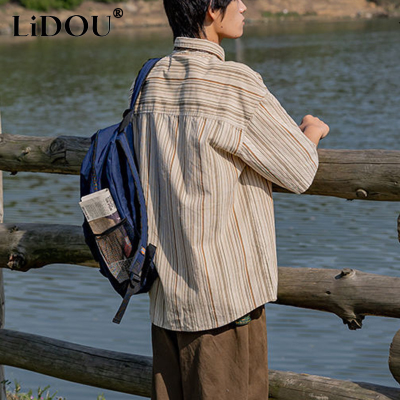 Kevadine sügismood Temperament Jaapani vintage pluus Meeste lihtsate triipudega avarate pikkade varrukatega vabaaja topp, mis sobib meeste särk