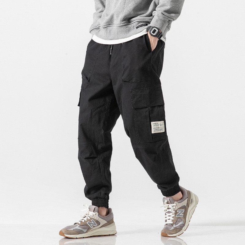 Klasična ulična odjeća Ležerne muške vrpce Haremske hlače za trčanje Muške uske proljetne hlače s više džepova Ženske hlače T23