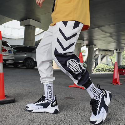 Tanke ulične ležerne hlače Muške vrpce Harem hlače za trčanje Muške uske proljetne kargo hlače Ženske hlače s više džepova Kq1