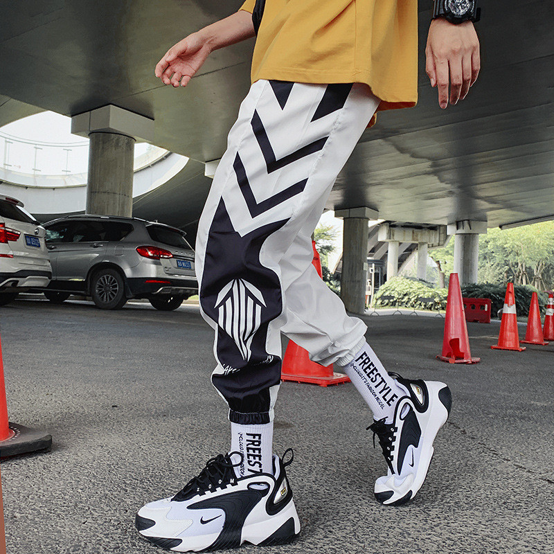 Tanke ulične ležerne hlače Muške vrpce Harem hlače za trčanje Muške uske proljetne kargo hlače Ženske hlače s više džepova Kq1