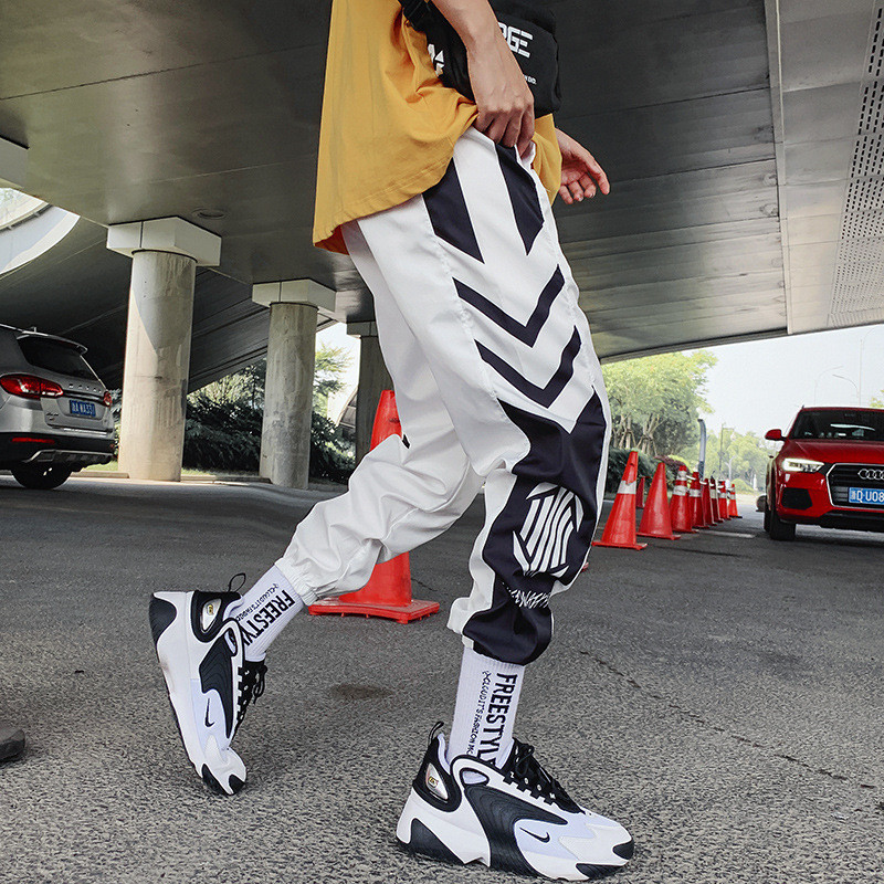 Tanke ulične ležerne hlače Muške vrpce Harem hlače za trčanje Muške uske proljetne kargo hlače Ženske hlače s više džepova Kq1