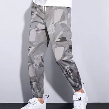 Класическо улично облекло Ежедневни мъжки панталони Harem Jogging Letter Pants Мъжки Slim Fit пролетни панталони Multi-джобове Дамски панталон T12
