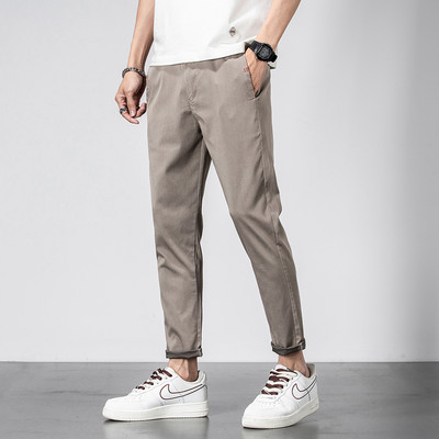 2023. aasta uued brändiriided, suvine pehme, hubane Lyocell vabaaja püksid meeste õhukesed venivad õhukesed pahkluu püksid Korea rohelised püksid meestele