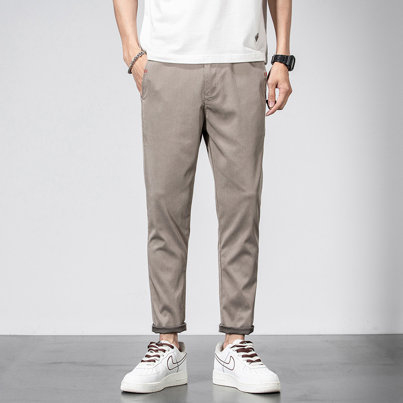 2023. aasta uued brändiriided, suvine pehme, hubane Lyocell vabaaja püksid meeste õhukesed venivad õhukesed pahkluu püksid Korea rohelised püksid meestele